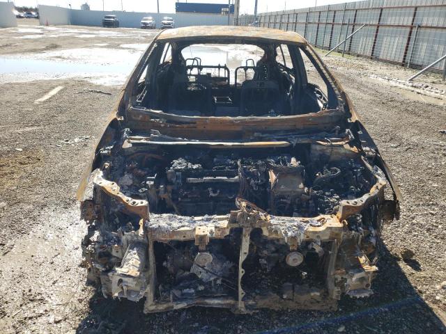 Photo 5 from auction – 2021 TOYOTA PRIUS PRIM with VIN JTDKAMFP3M3173159