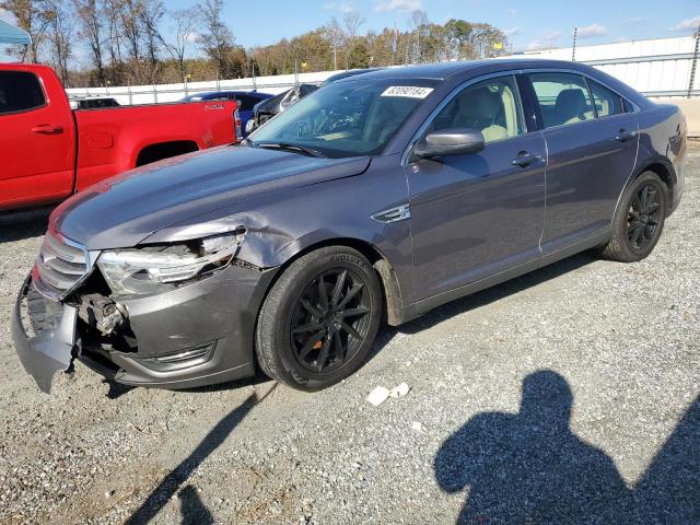 FORD TAURUS SEL 2013 with VIN 1FAHP2E87DG205827 - Photo from auction