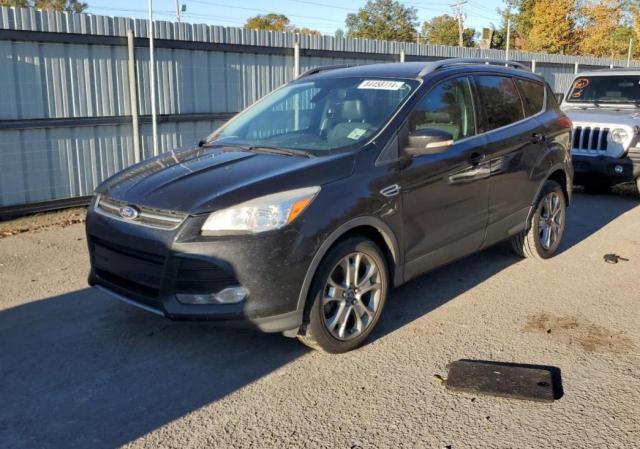 FORD ESCAPE TIT 2014 with VIN 1FMCU0J96EUD45897 - Photo from auction