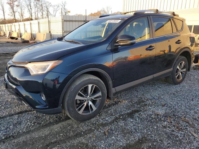 TOYOTA RAV4 XLE 2017 with VIN JTMRFREVXHJ704145 - Photo from auction