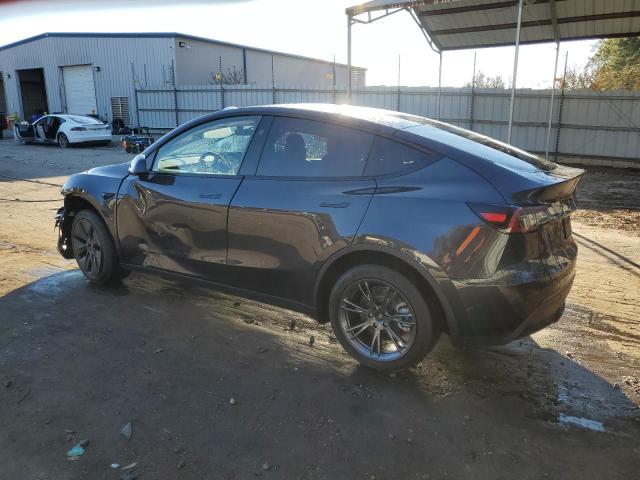 Photo 2 from auction – 2025 TESLA MODEL Y with VIN 7SAYGAEE6SF214877