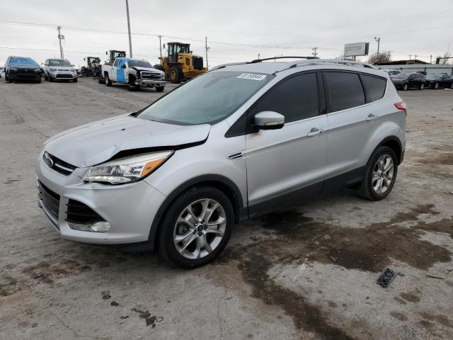 FORD ESCAPE TIT 2014 with VIN 1FMCU0J90EUC84563 - Photo from auction
