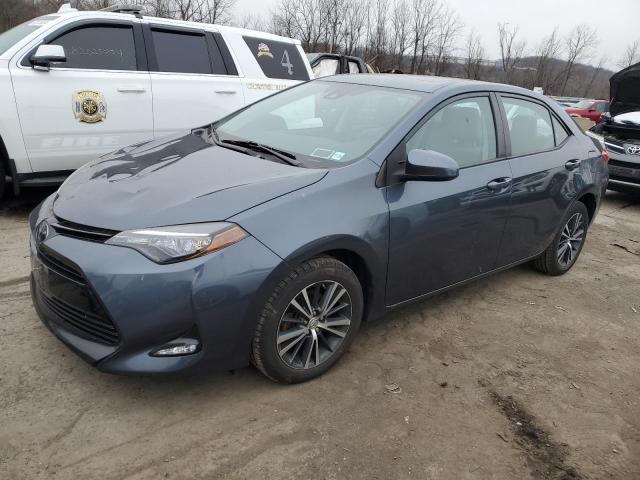 TOYOTA COROLLA L 2017 with VIN 2T1BURHE8HC764097 - Photo from auction