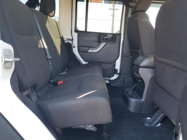 Photo 11 from auction – 2015 JEEP WRANGLER U with VIN 1C4BJWDG6FL754009
