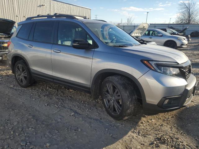 Photo 4 from auction – 2020 HONDA PASSPORT E with VIN 5FNYF8H58LB011303