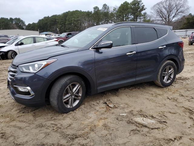 HYUNDAI SANTA FE S 2018 with VIN 5NMZU3LB3JH069325 - Photo from auction