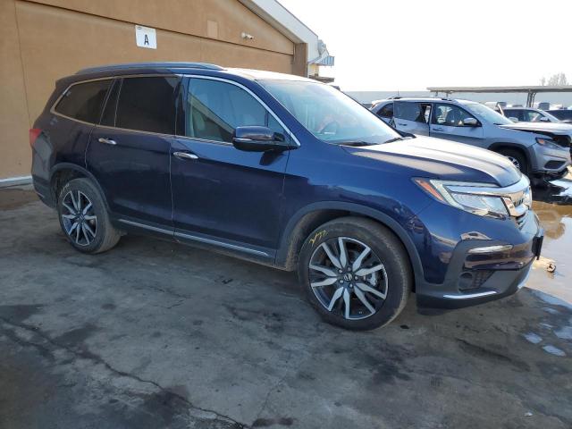 Photo 4 from auction – 2022 HONDA PILOT TOUR with VIN 5FNYF6H96NB013092