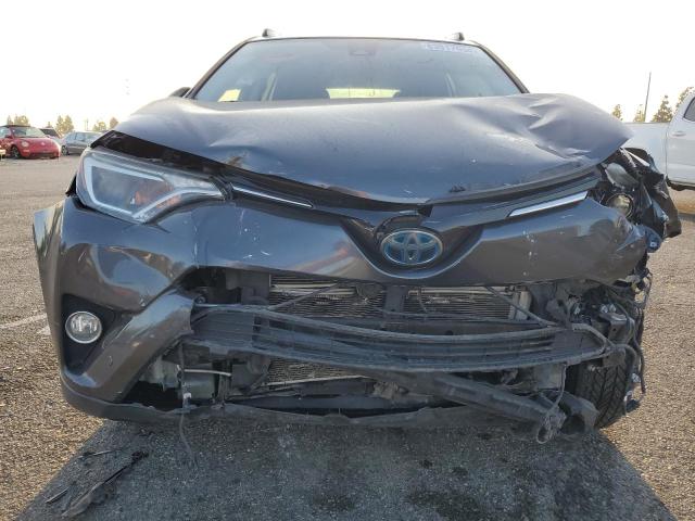 Photo 5 from auction – 2018 TOYOTA RAV4 HV LE with VIN JTMRJREV6JD228317