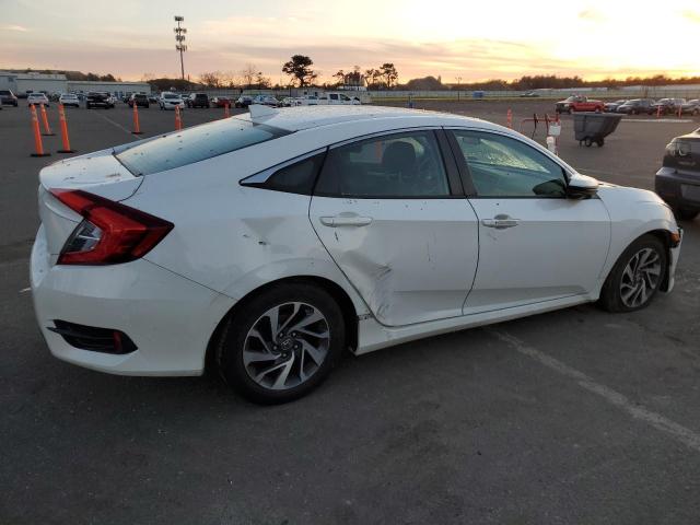 Photo 3 from auction – 2018 HONDA CIVIC EX with VIN 2HGFC2F77JH557908