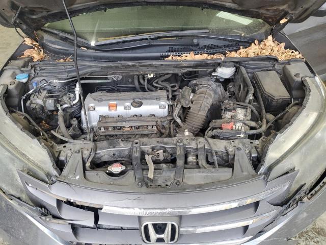 Photo 12 from auction – 2014 HONDA CR-V LX with VIN 3CZRM3H38EG711583