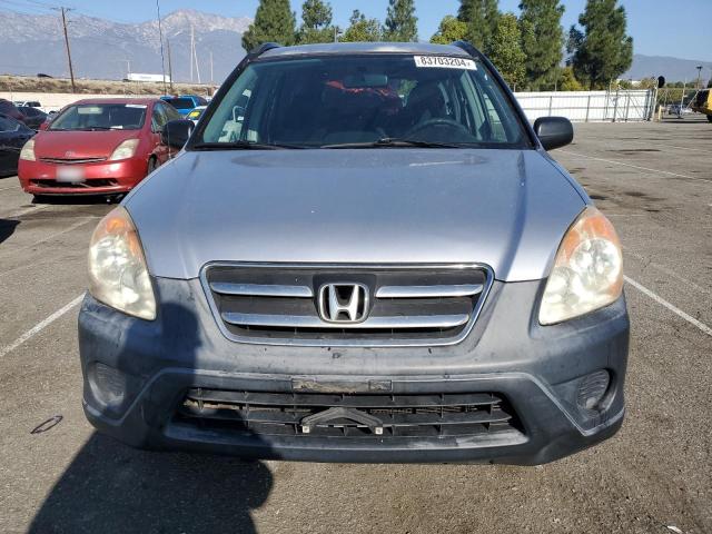 Photo 5 from auction – 2005 HONDA CR-V LX with VIN JHLRD68595C004409