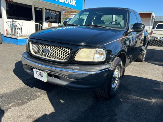 Photo 2 from auction – 2000 FORD F150 with VIN 1FTRX07L8YKA69876