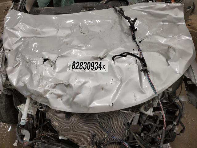 Photo 12 from auction – 2015 NISSAN ROGUE S with VIN 5N1AT2MV3FC853475