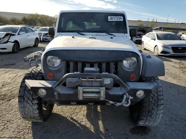 Photo 5 from auction – 2012 JEEP WRANGLER U with VIN 1C4HJWDGXCL268227