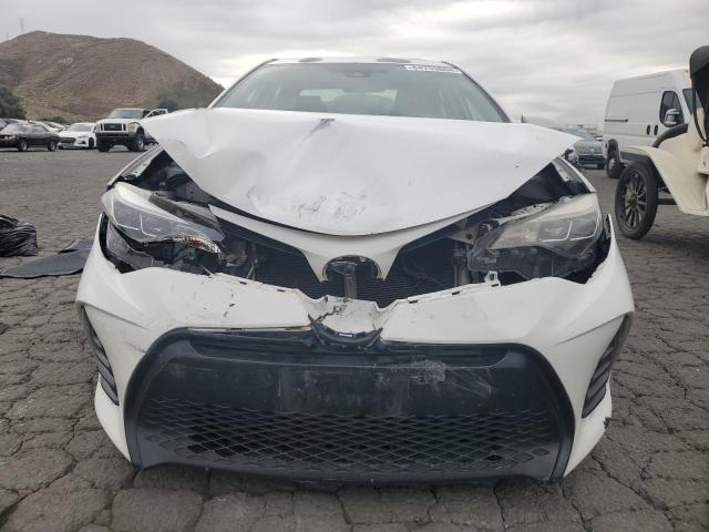 Photo 5 from auction – 2017 TOYOTA COROLLA L with VIN 5YFBURHE2HP590687