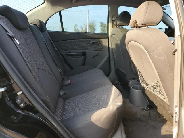 Photo 10 from auction – 2011 KIA RIO BASE with VIN KNADH4A33B6858408