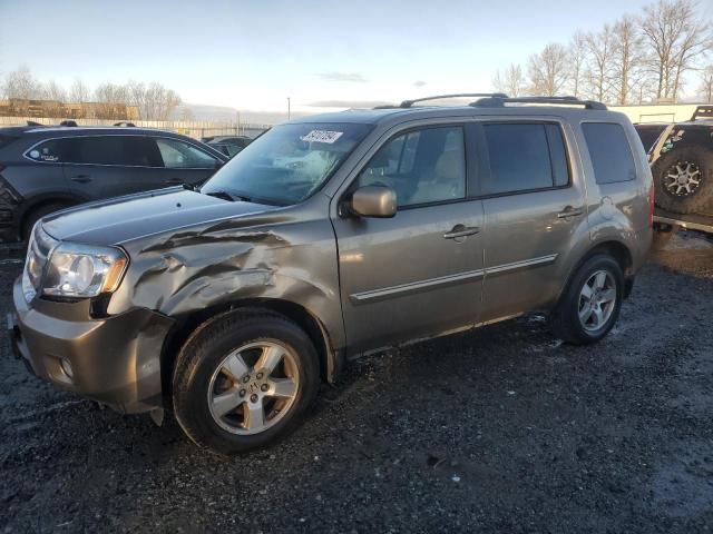 HONDA PILOT EXL 2010 with VIN 5FNYF4H59AB021618 - Photo from auction