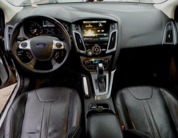 Photo 8 from auction – 2012 FORD FOCUS TITA with VIN 1FAHP3N29CL261825