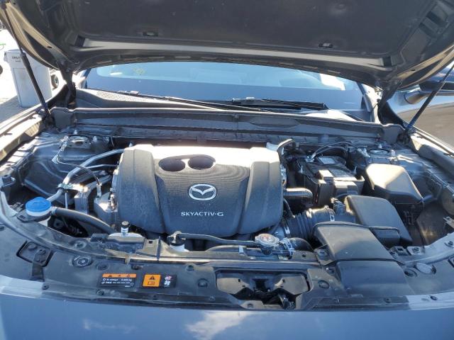 Photo 12 from auction – 2024 MAZDA CX-50 PREM with VIN 7MMVABEM5RN160630