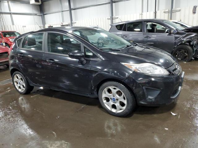 Photo 4 from auction – 2011 FORD FIESTA SES with VIN 3FADP4FJXBM221843