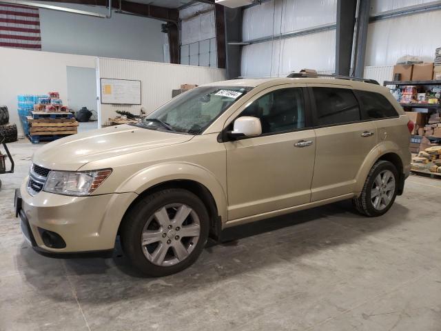 DODGE JOURNEY R/ 2011 with VIN 3D4PH6FG5BT570910 - Photo from auction