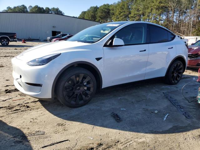 TESLA MODEL Y 2024 with VIN 7SAYGAEE0RF160342 - Photo from auction