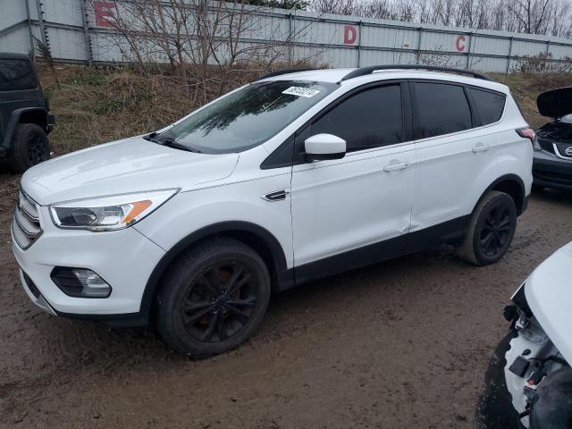 FORD ESCAPE SE 2018 with VIN 1FMCU9GD6JUB23581 - Photo from auction