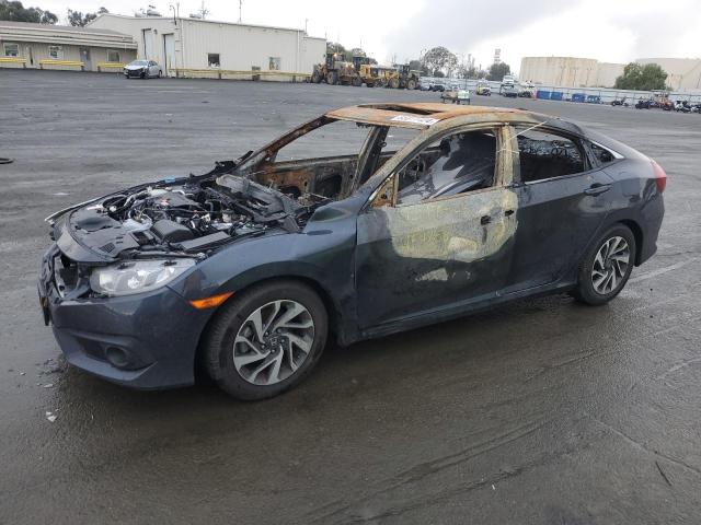 Photo 1 from auction – 2018 HONDA CIVIC EX with VIN 2HGFC2F80JH592167