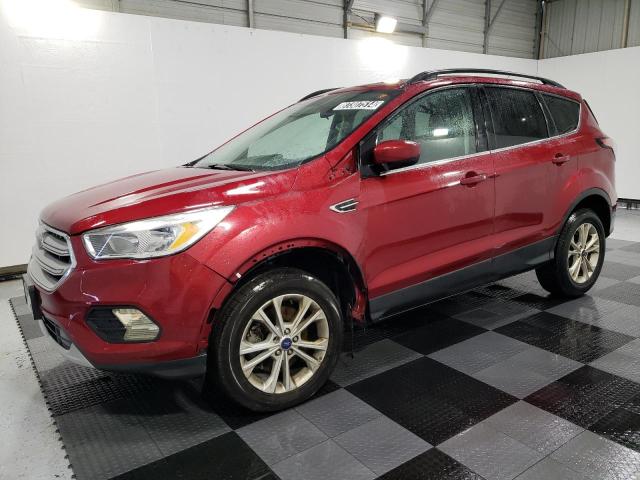 FORD ESCAPE SE 2018 with VIN 1FMCU9G99JUC13674 - Photo from auction