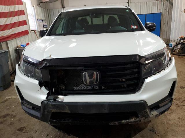 Photo 5 from auction – 2022 HONDA RIDGELINE with VIN 5FPYK3F83NB029083