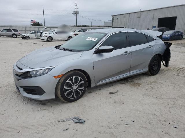 HONDA CIVIC LX 2016 with VIN 19XFC2F5XGE022704 - Photo from auction