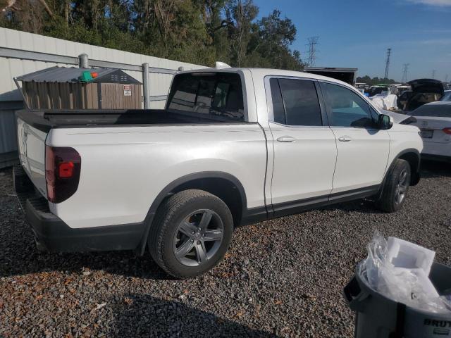 Photo 3 from auction – 2023 HONDA RIDGELINE with VIN 5FPYK3F54PB017968