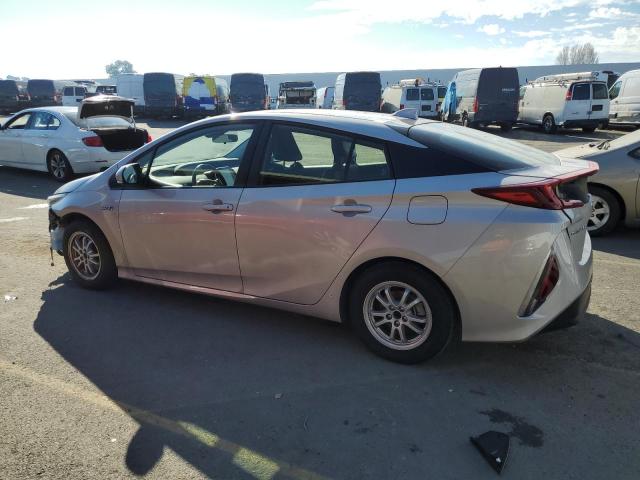 Photo 2 from auction – 2021 TOYOTA PRIUS PRIM with VIN JTDKAMFP3M3190608