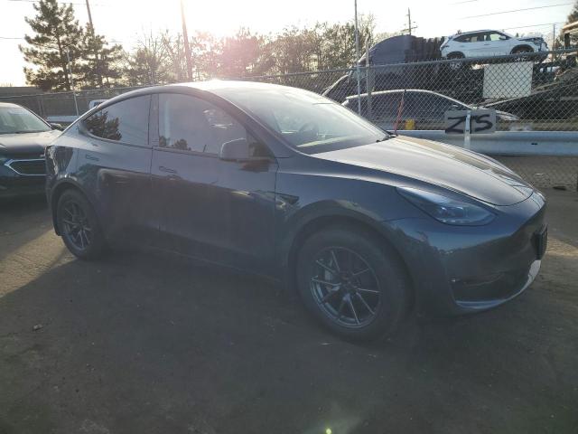 Photo 4 from auction – 2023 TESLA MODEL Y with VIN 7SAYGDEE2PF909625