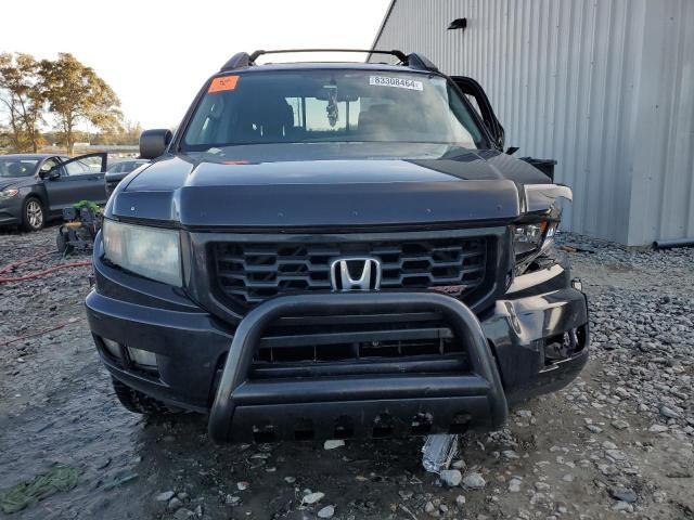 Photo 5 from auction – 2014 HONDA RIDGELINE with VIN 5FPYK1F79EB014681