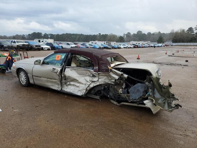 Photo 2 from auction – 2004 LINCOLN TOWN CAR E with VIN 1LNHM81W14Y635093
