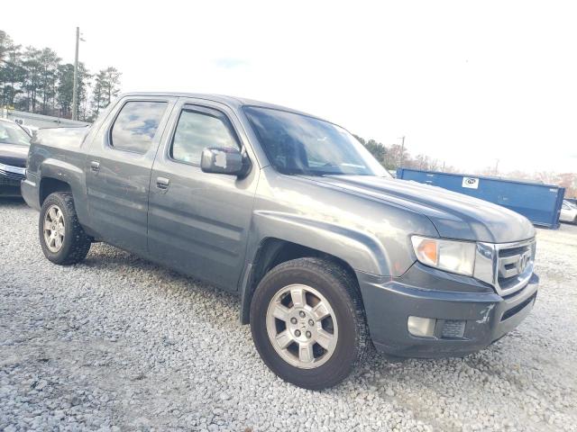 Photo 4 from auction – 2011 HONDA RIDGELINE with VIN 5FPYK1F46BB001193