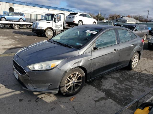 FORD FOCUS SE 2018 with VIN 1FADP3FE2JL306690 - Photo from auction