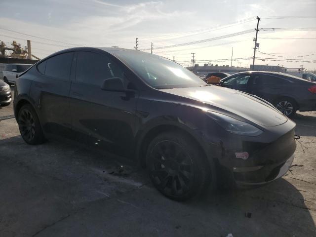 Photo 4 from auction – 2023 TESLA MODEL Y with VIN 7SAYGDEE1PF881834