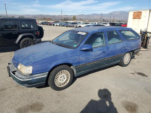 FORD TAURUS GL 1990 with VIN 1FACP5747LA124012 - Photo from auction