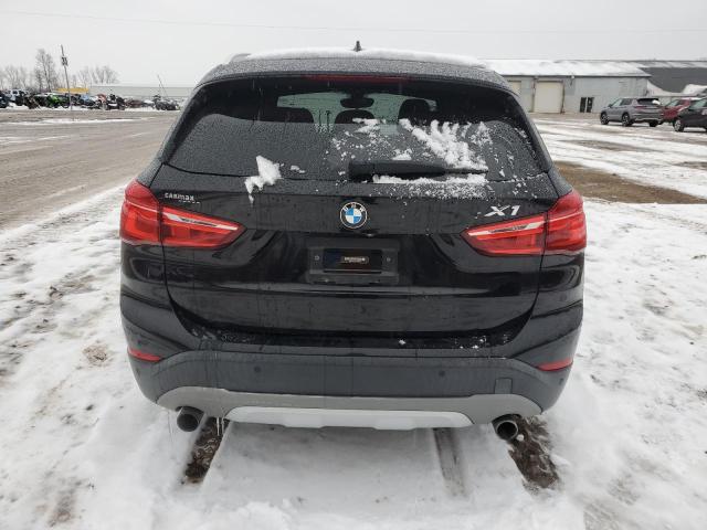 Photo 6 from auction – 2016 BMW X1 XDRIVE2 with VIN WBXHT3C3XG5F67045