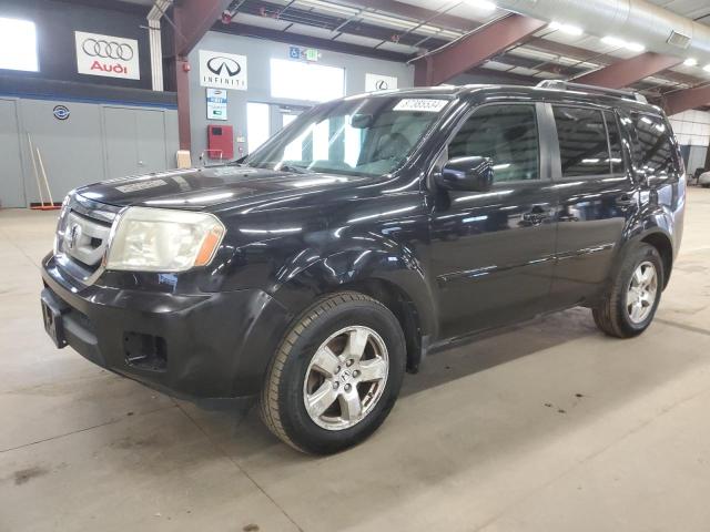 HONDA PILOT EXL 2011 with VIN 5FNYF4H66BB046616 - Photo from auction