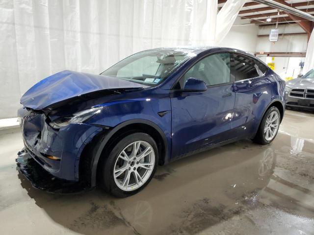 TESLA MODEL Y 2022 with VIN 7SAYGDEE7NA009684 - Photo from auction