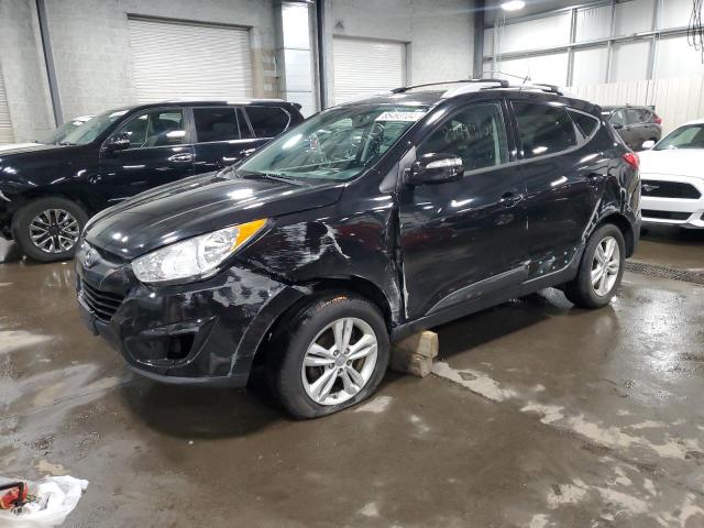 HYUNDAI TUCSON GLS 2012 with VIN KM8JUCAC6CU397810 - Photo from auction
