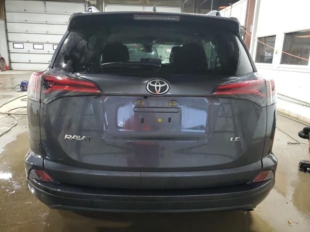 Photo 6 from auction – 2018 TOYOTA RAV4 LE with VIN JTMZFREV5JJ194776