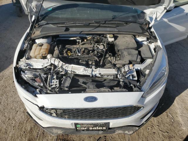 Photo 11 from auction – 2018 FORD FOCUS SE with VIN 1FADP3K29JL262294