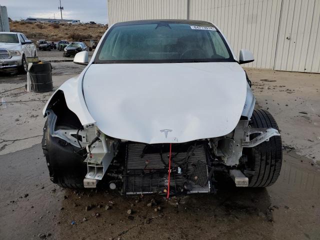 Photo 5 from auction – 2022 TESLA MODEL Y with VIN 7SAYGAEE0NF568396
