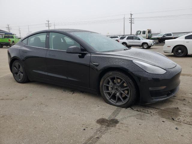 Photo 4 from auction – 2021 TESLA MODEL 3 with VIN 5YJ3E1EB5MF974837