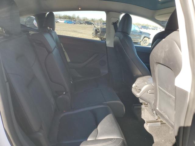 Photo 11 from auction – 2022 TESLA MODEL Y with VIN 7SAYGAEE2NF329433