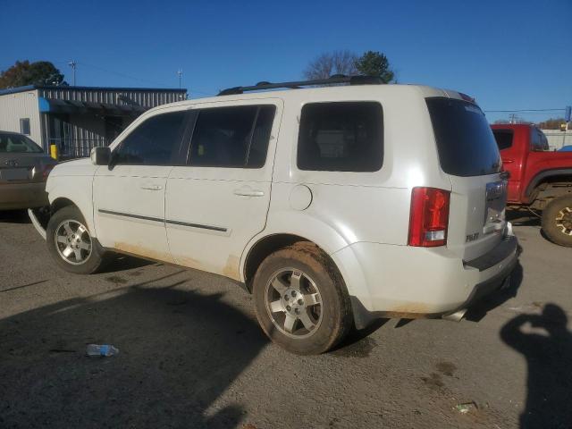 Photo 2 from auction – 2011 HONDA PILOT TOUR with VIN 5FNYF3H9XBB049152